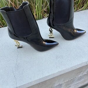 Saint Laurent Black Heeled Boots with Logo Heel